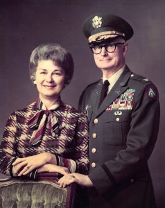 Colonel Hyle wearing military uniform standing beside Dorothy Hyle.