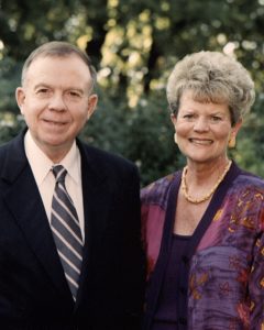 Image of Jon and Ruth Ann standing outside together.