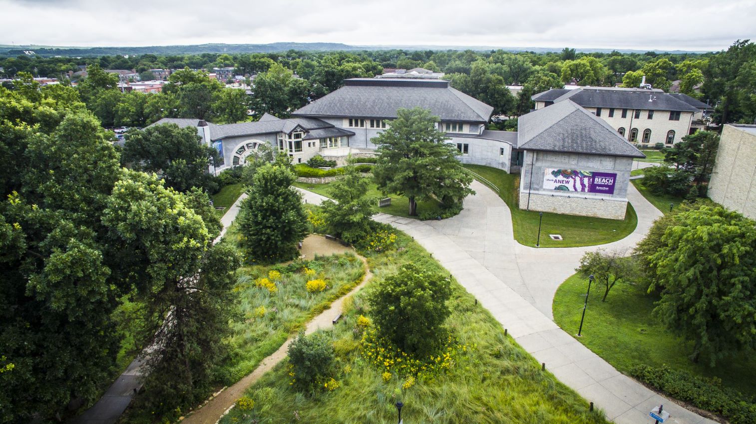 Aerial view of the Beach Museum of Art including the Meadow during the summer.