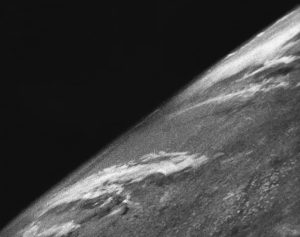 Grainy, black and white photo from 1946 showing a portion of the Earth from space.
