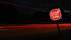 Picture of a stop sign. Prompt below with question to consider.