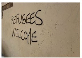 Graffiti from Venice, Italy, which reads, "Refugees Welcome."